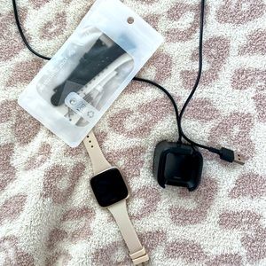 Rose gold Fitbit versa 2